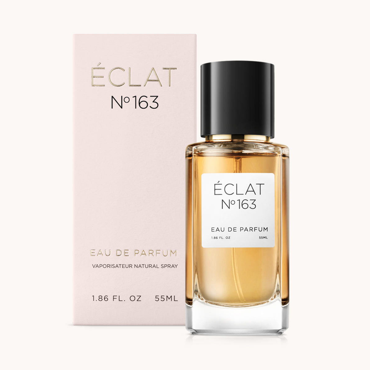 ÉCLAT No. 163 fragrance bottle with matching light pink packaging. The elegant glass flacon features a black cylindrical magnetic cap and a simple white label with the inscription ÉCLAT No. 163 and “Eau de Parfum”.