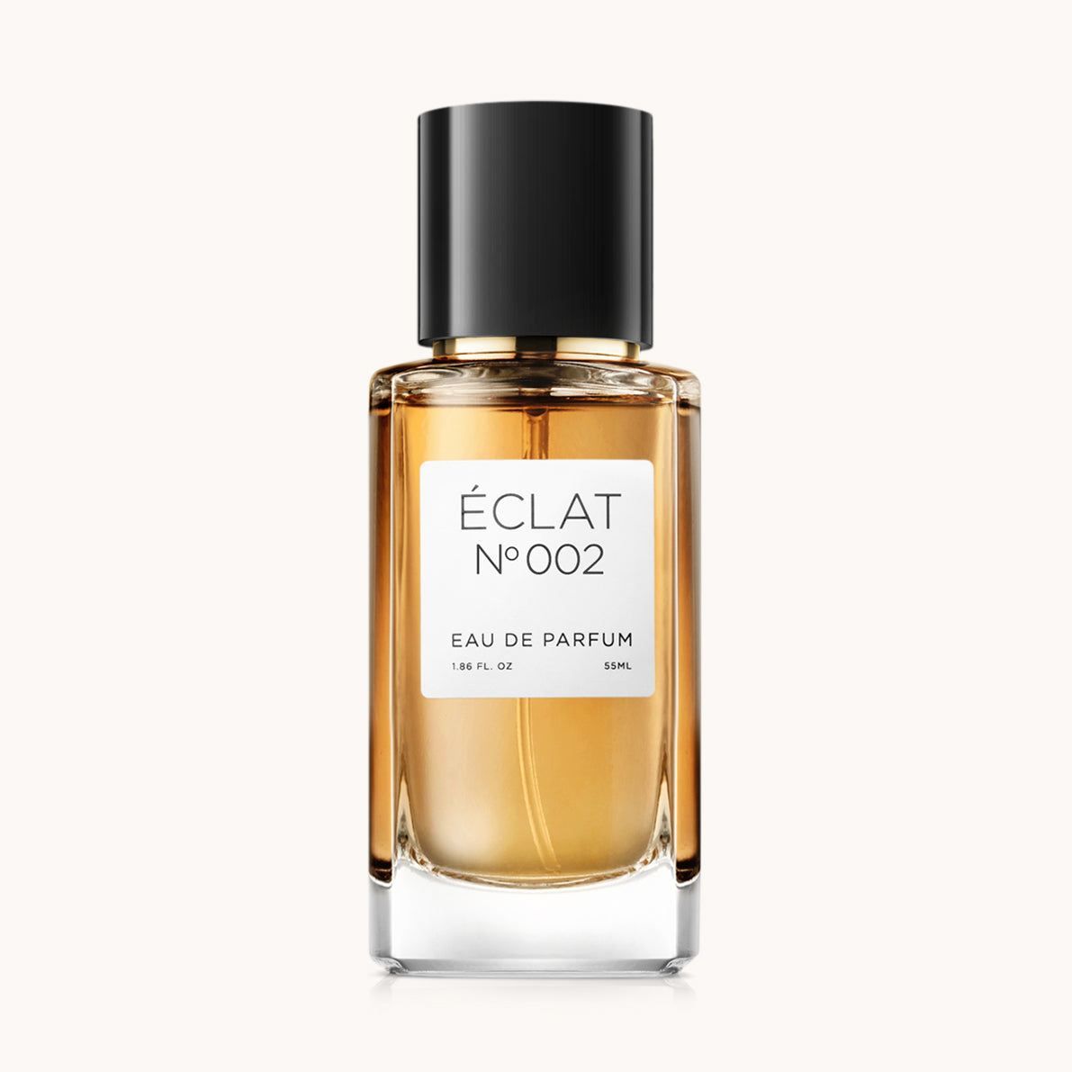 Flacon of the women's perfume dupe ÉCLAT No. 002, an elegant transparent glass bottle with a black cylindrical magnetic cap and a white label. The label features the brand name ÉCLAT, the number 002, and the words “Eau de Parfum”.