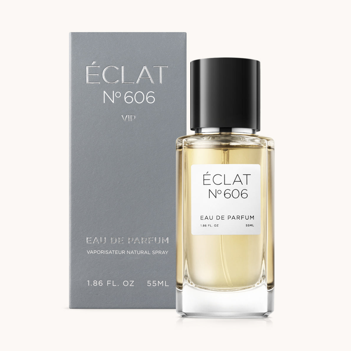 ÉCLAT No. 606 VIP men’s perfume bottle with matching bluish-grey packaging. The elegant flacon features a black cylindrical magnetic cap and a clean white label with the inscription ÉCLAT No. 606 VIP and “Eau de Parfum”.