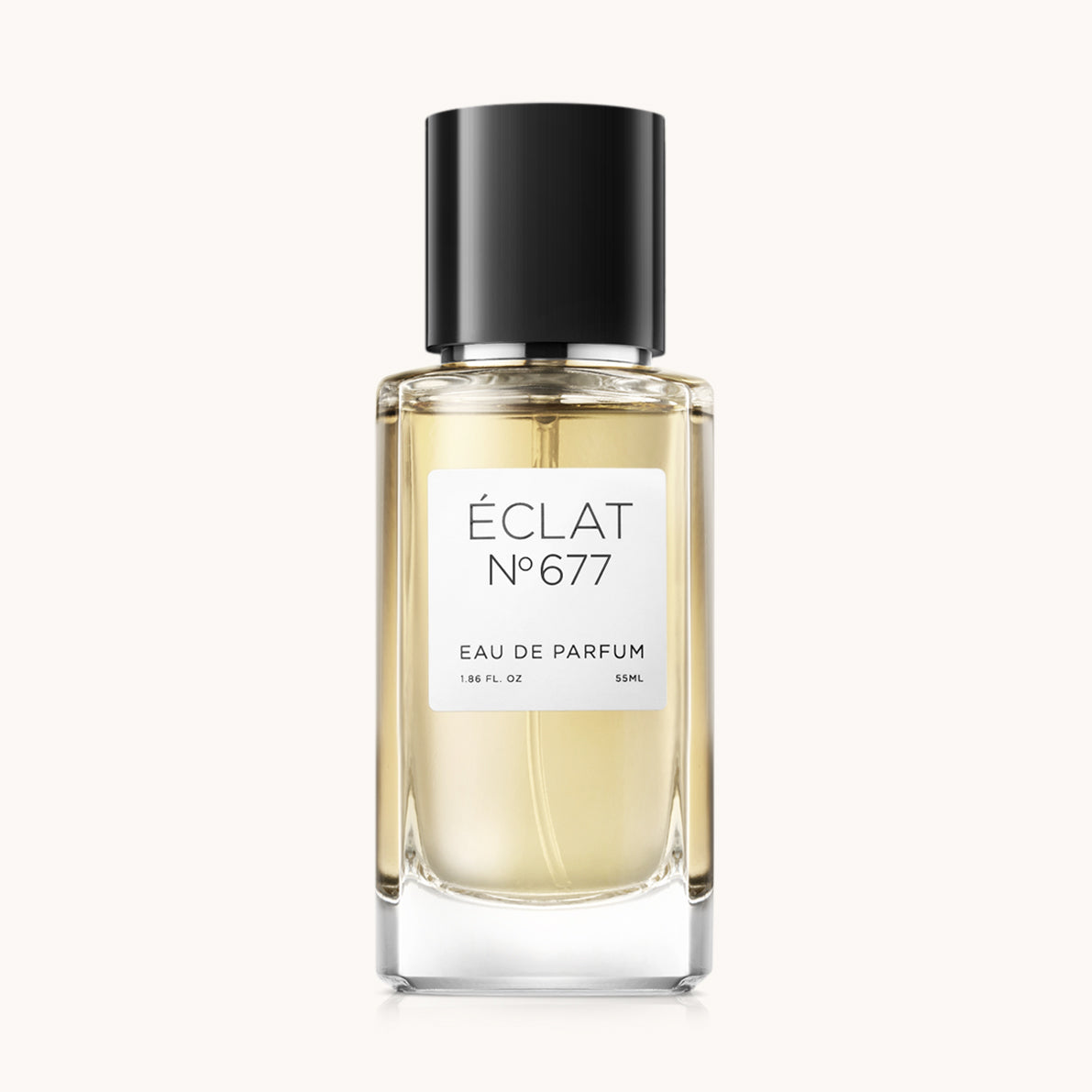 Flacon of the men’s perfume dupe ÉCLAT No. 677, an elegant transparent glass bottle with a black cylindrical magnetic cap and a minimalist white label. The label displays the brand name ÉCLAT, the number 677, and the phrase “Eau de Parfum”.