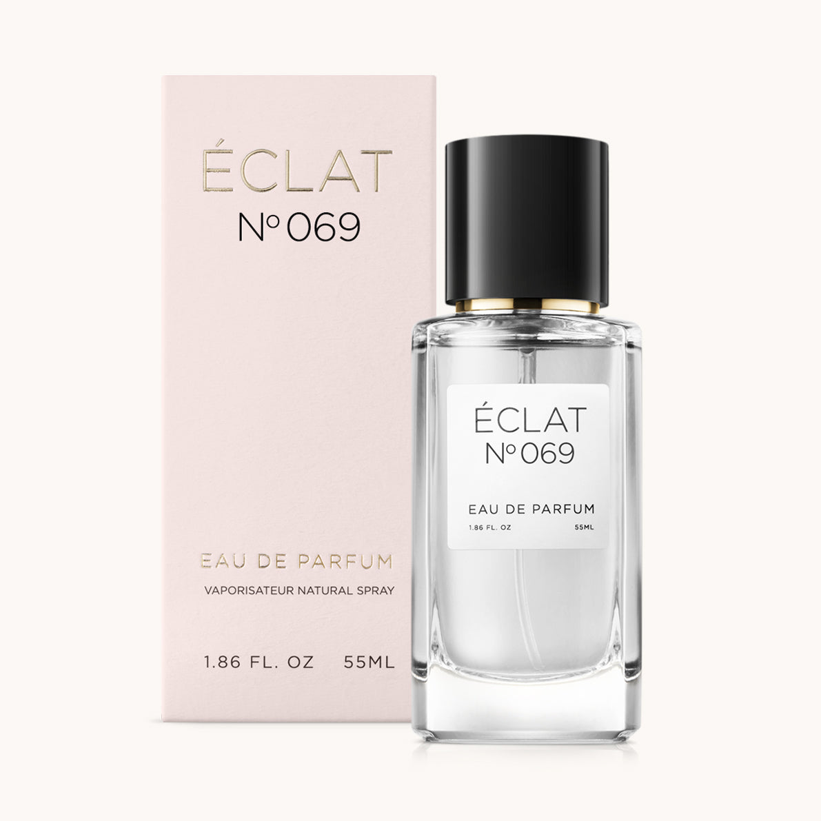 ÉCLAT No. 069 perfume bottle with matching light pink packaging. The elegant glass flacon features a black cylindrical magnetic cap and a simple white label with the inscription ÉCLAT No. 069 and “Eau de Parfum”.