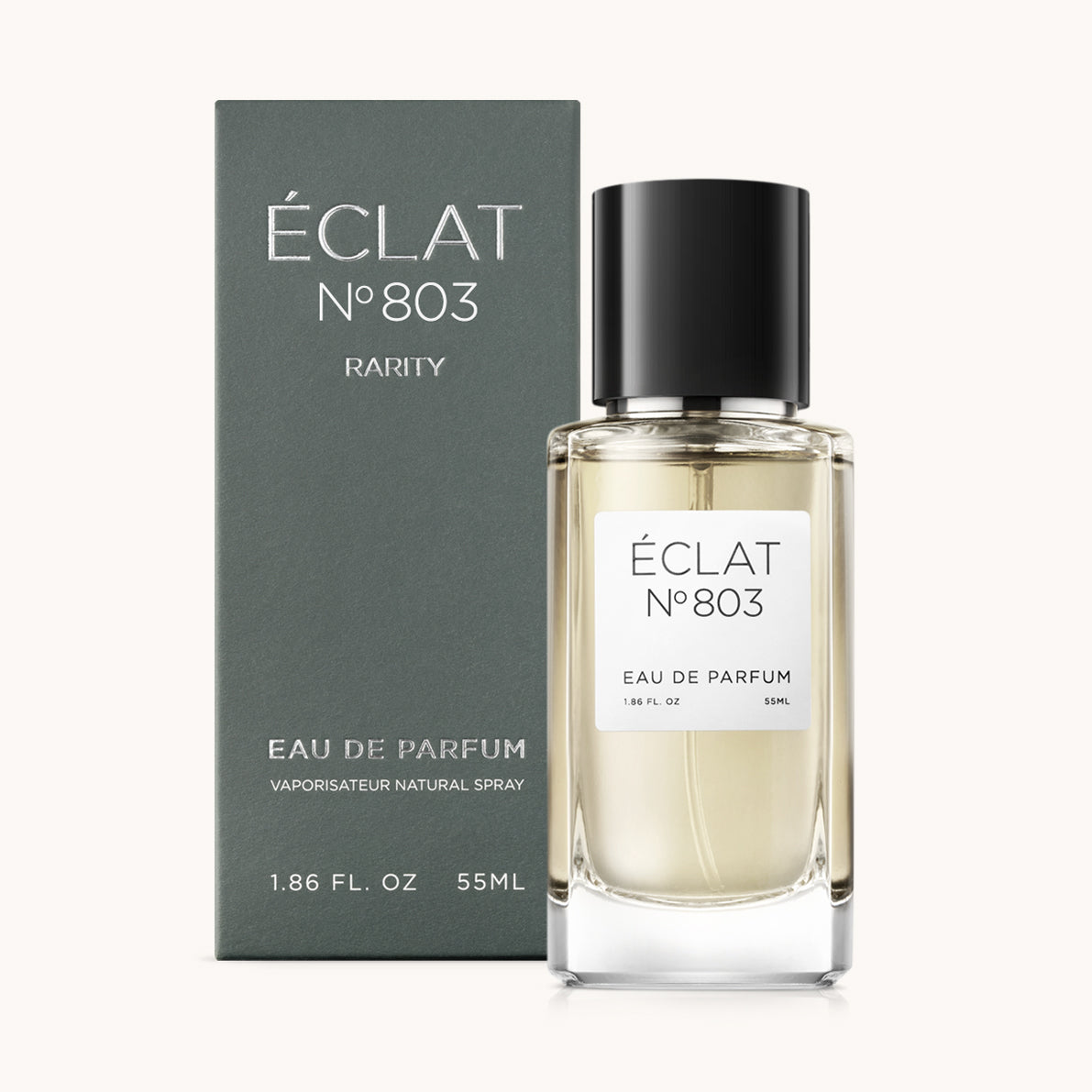 ÉCLAT No. 803 RAR men’s perfume bottle with matching green packaging. The elegant flacon features a black cylindrical magnetic cap and a clean white label with the inscription ÉCLAT No. 803 RAR and “Eau de Parfum”.