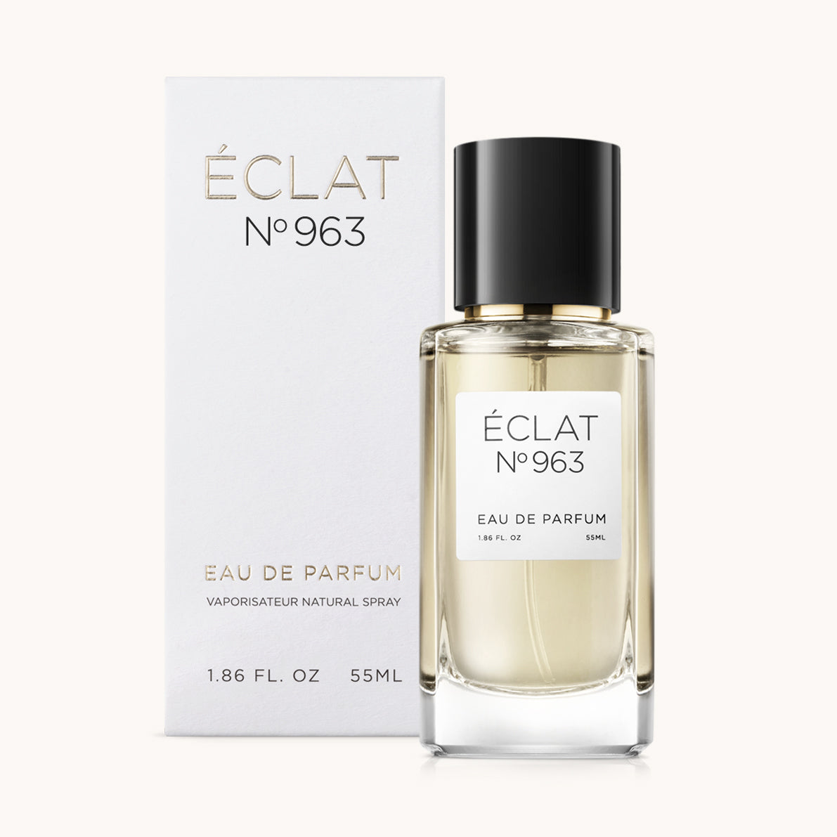 ÉCLAT No. 963 unisex perfume bottle with matching very light grey packaging. The elegant flacon features a black cylindrical magnetic cap and a clean white label with the inscription ÉCLAT No. 963 and “Eau de Parfum”.