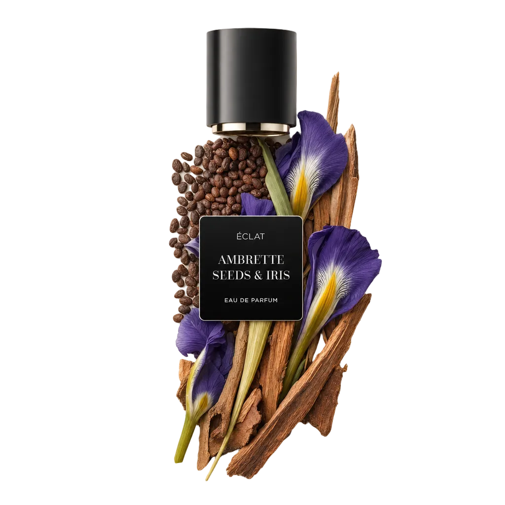 Un arrangiamento di semi di ambretta, fiori di iris ed elementi in legno con un cappuccio nero etichettato 'ÉCLAT Ambrette Seeds & Iris.'