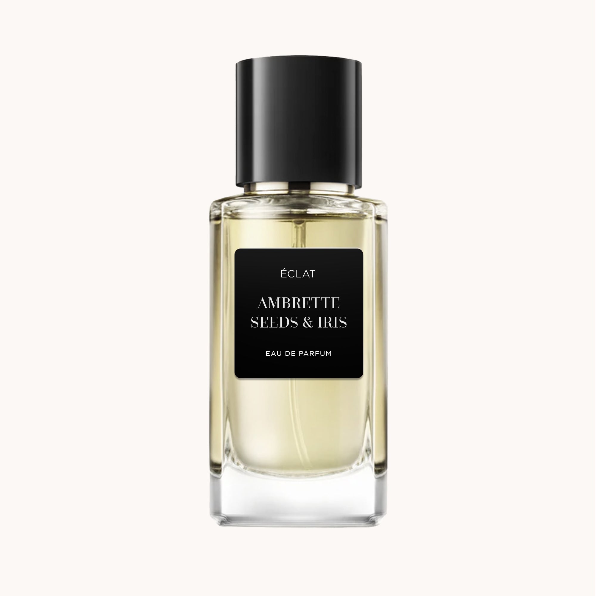Profumo ÉCLAT Ambrette Seeds & Iris in un flacone di vetro trasparente con tappo nero e etichetta nera opaca.