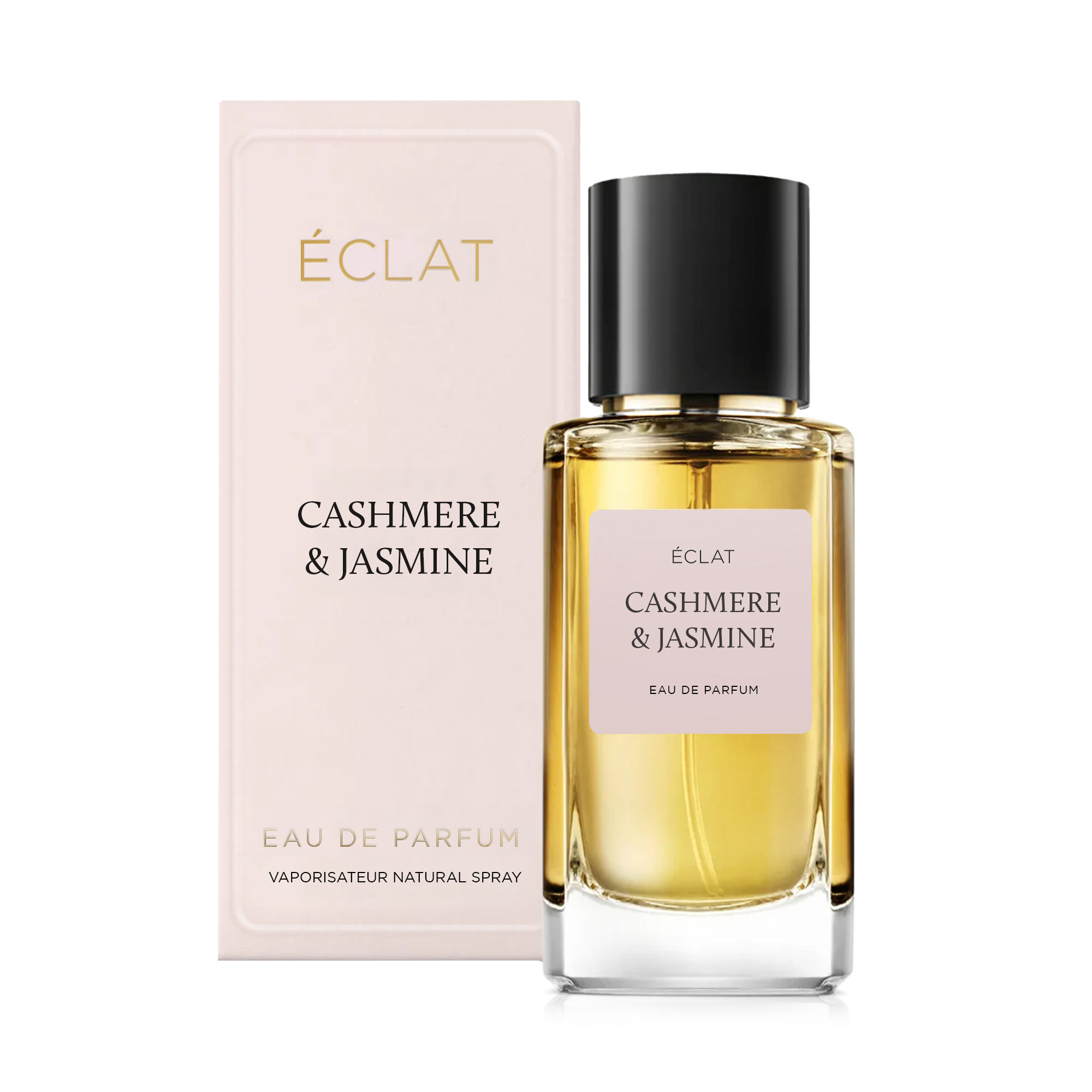 Flacone in vetro sfaccettato con etichetta rosa tenue e tappo nero, accanto a una scatola elegante con ÉCLAT Cashmere & Jasmine.