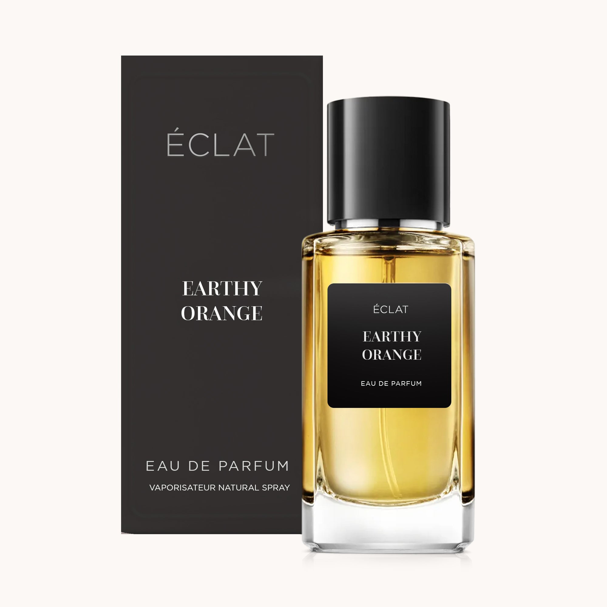 Fiala in vetro sfaccettato ÉCLAT Earthy Orange con etichetta nera opaca e scatola di presentazione coordinata.