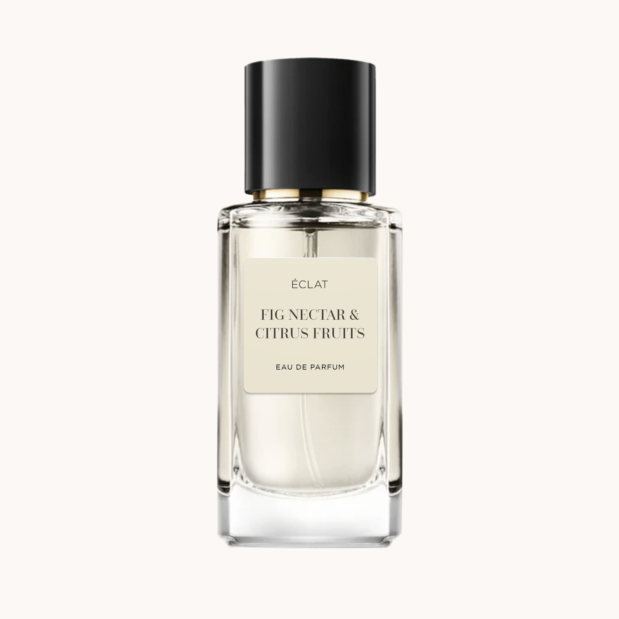 Elegante flacone di vetro di ÉCLAT Fig Nectar & Citrus Fruits con tappo nero e etichetta beige morbida.