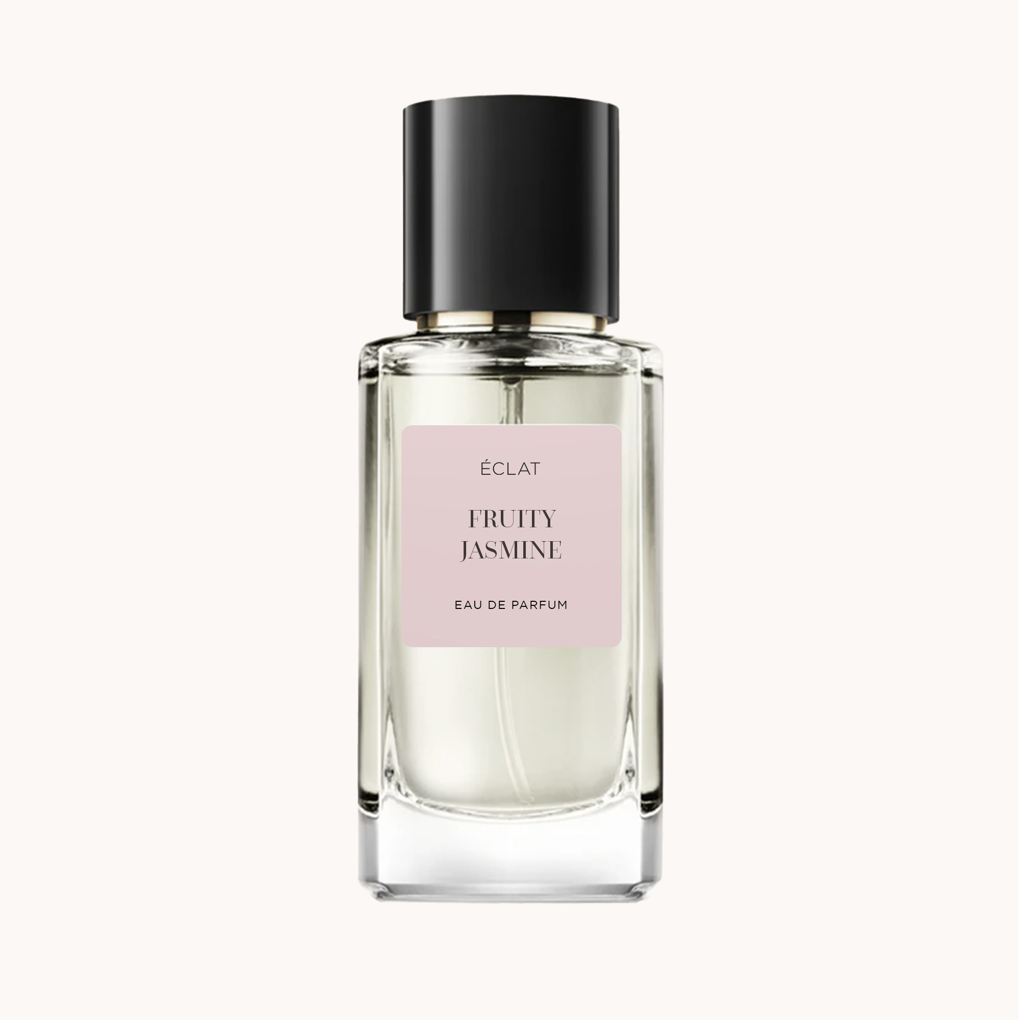 Elegante flacone in vetro di ÉCLAT Fruity Jasmine con tappo nero lucido e etichetta rosa tenue.