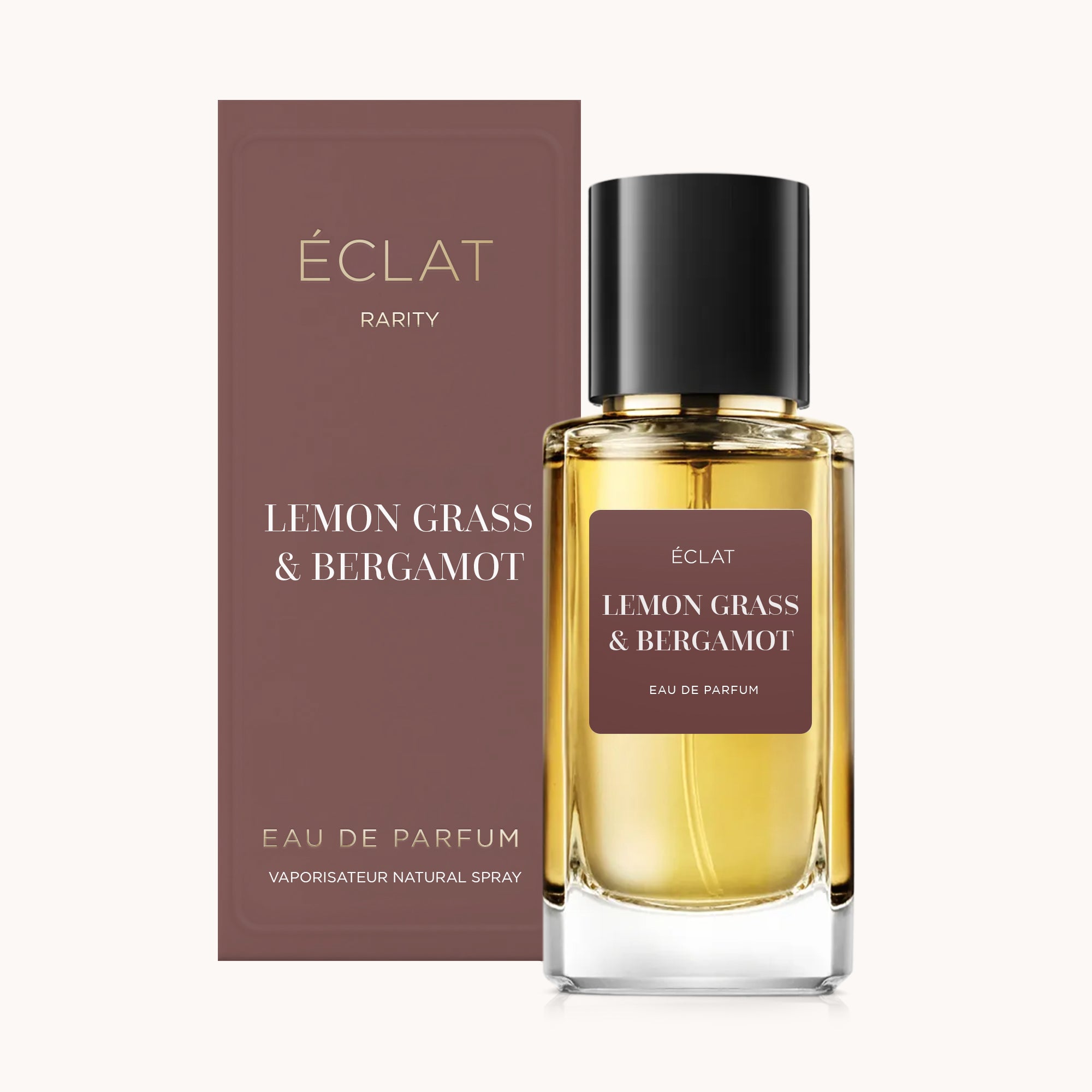 L'ÉCLAT Lemon Grass & Bergamot RAR presenta un flacone in vetro sfaccettato con tappo nero e un elegante packaging coordinato nelle tonalità del marrone scuro.