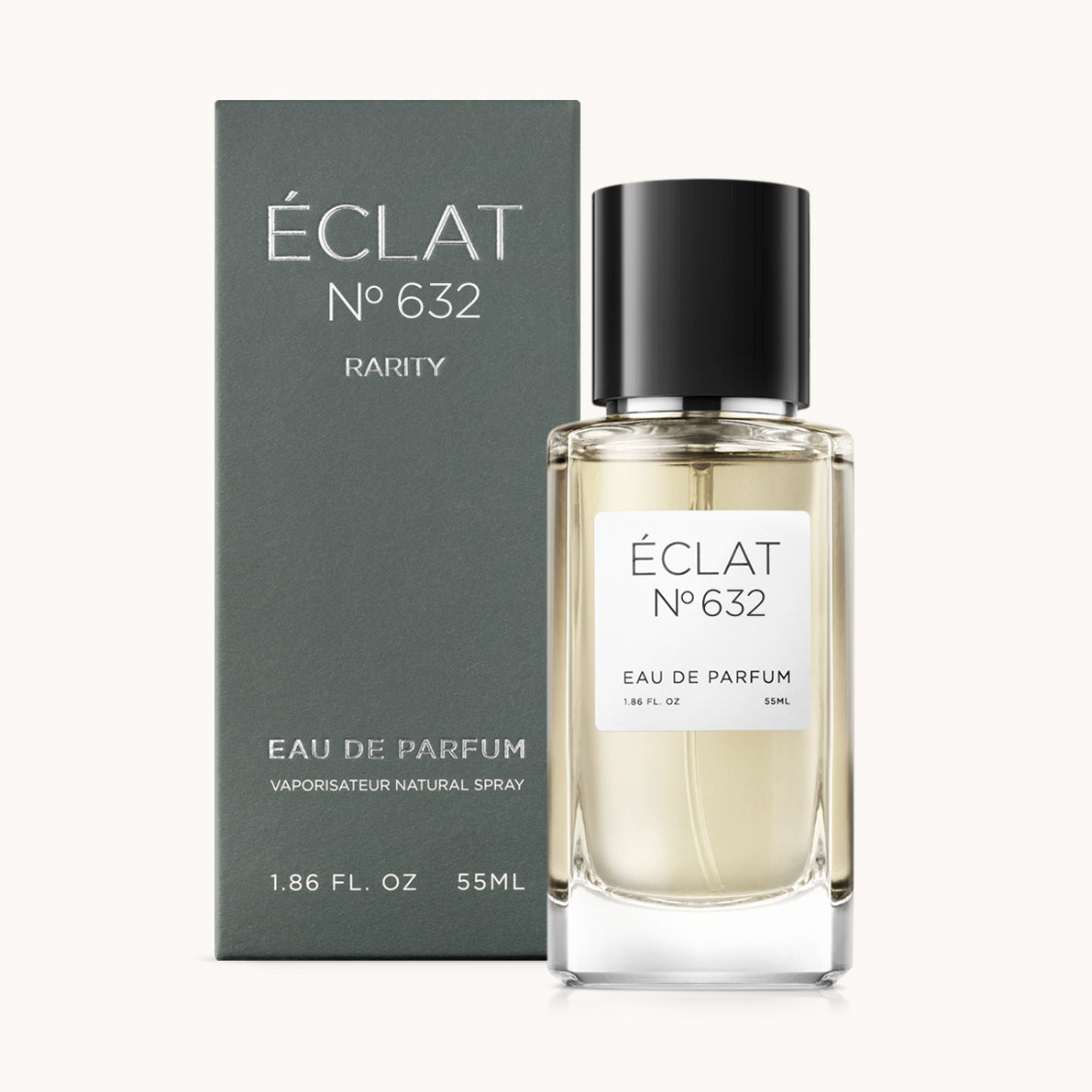 ÉCLAT Saffron, Oud & Praline in un flacone di vetro sfaccettato con tappo nero, accanto a una scatola scura.