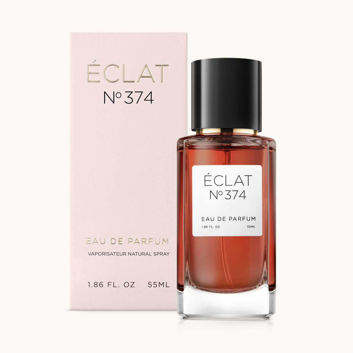Profumo ÉCLAT Sweet Honey in bottiglia di vetro trasparente con tappo nero, accanto a una scatola rosa chiaro con scritte dorate.