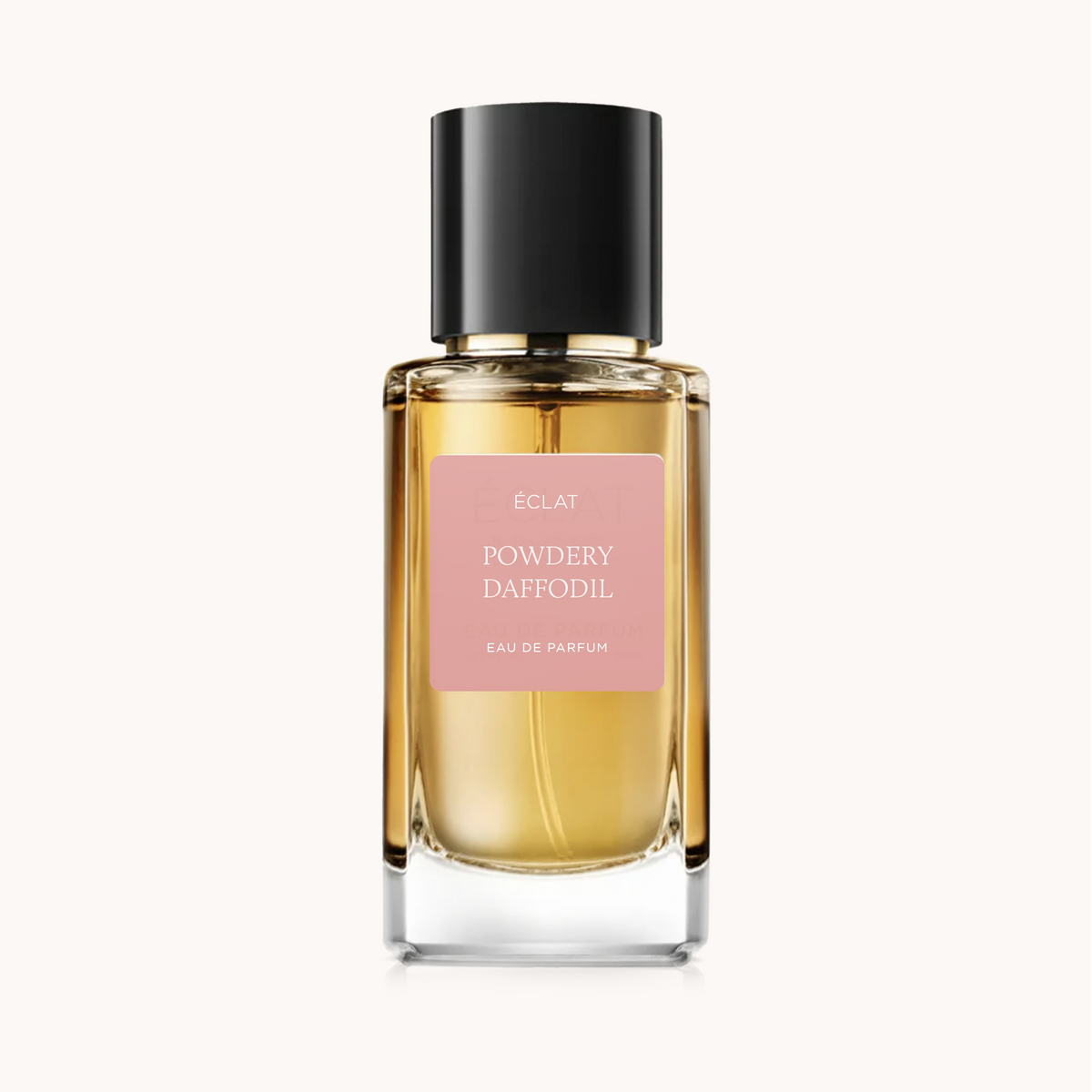 ÉCLAT Powdery Daffodil in un flacone di vetro sfaccettato con tappo nero e etichetta rosa opaca.