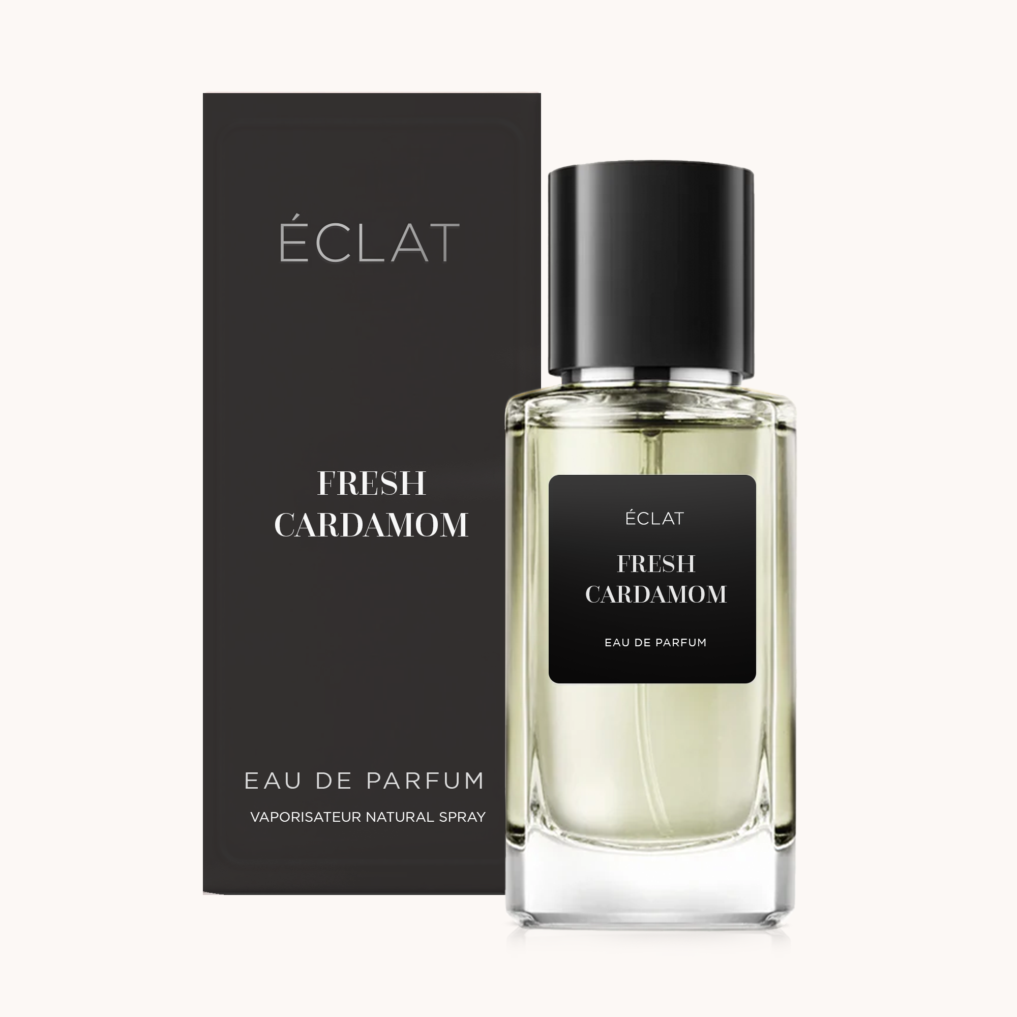 Flacone di profumo ÉCLAT Fresh Cardamom con etichetta e tappo neri, accanto a una scatola nera coordinata.