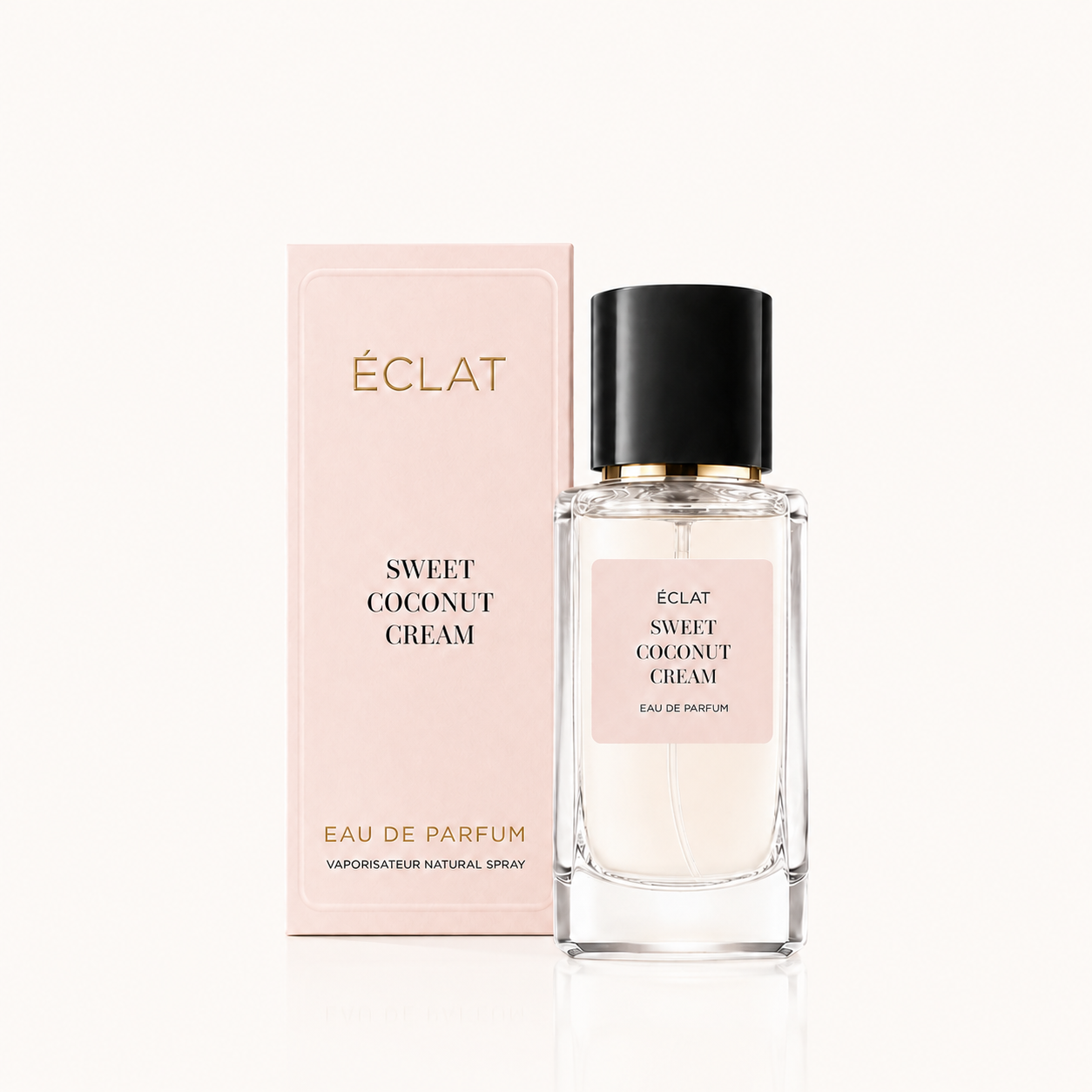 Flacone di vetro sfaccettato di ÉCLAT Sweet Coconut Cream con tappo nero, accanto a una confezione rosa.