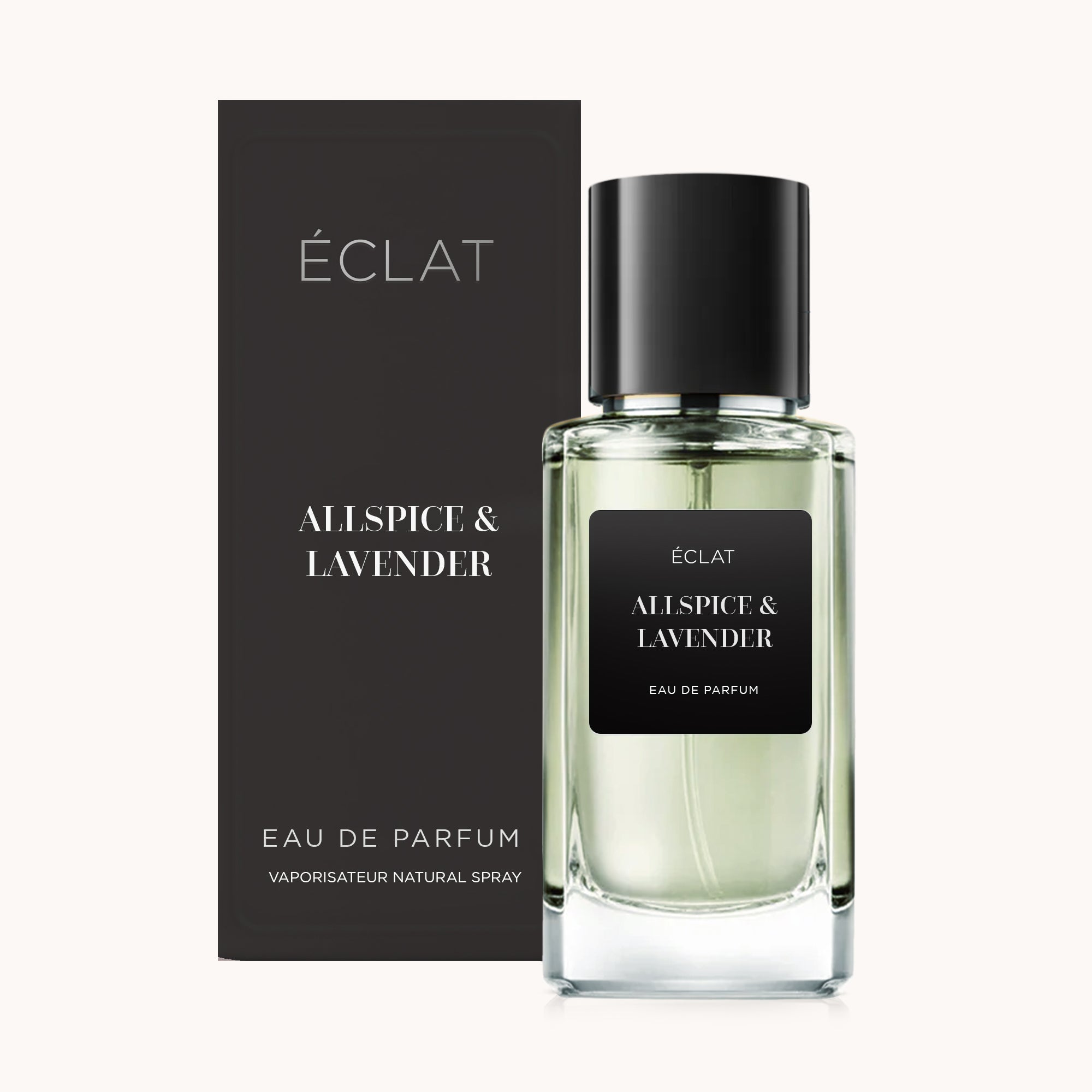 Una bottiglia di vetro sfaccettato di ÉCLAT Allspice & Lavender con tappo nero, accanto a una elegante scatola nera.