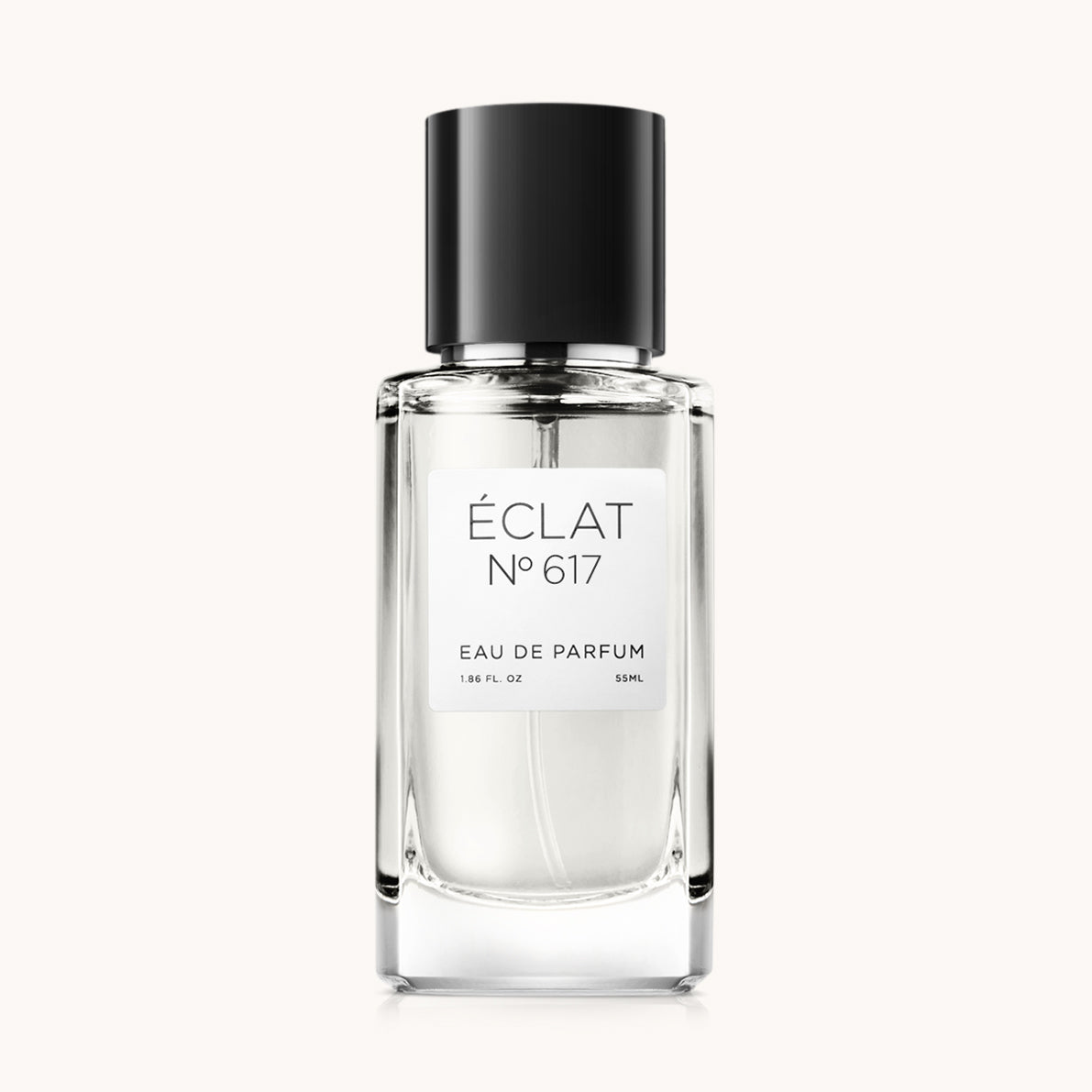 Un flacone di vetro trasparente con tappo nero presenta ÉCLAT Ambery Dates Eau de Parfum.