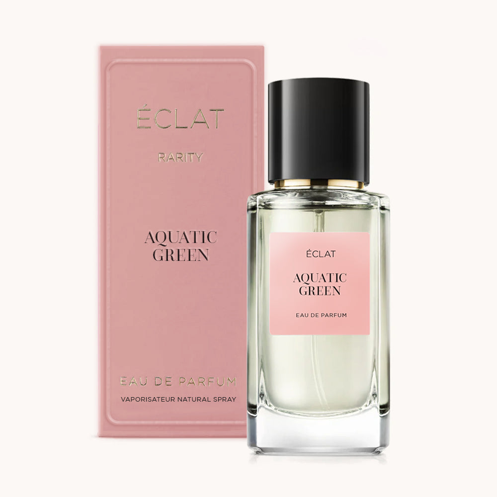 ÉCLAT Aquatic Green RAR in un flacone di vetro trasparente con tappo nero, accompagnato da una scatola rosa con marchio elegante.