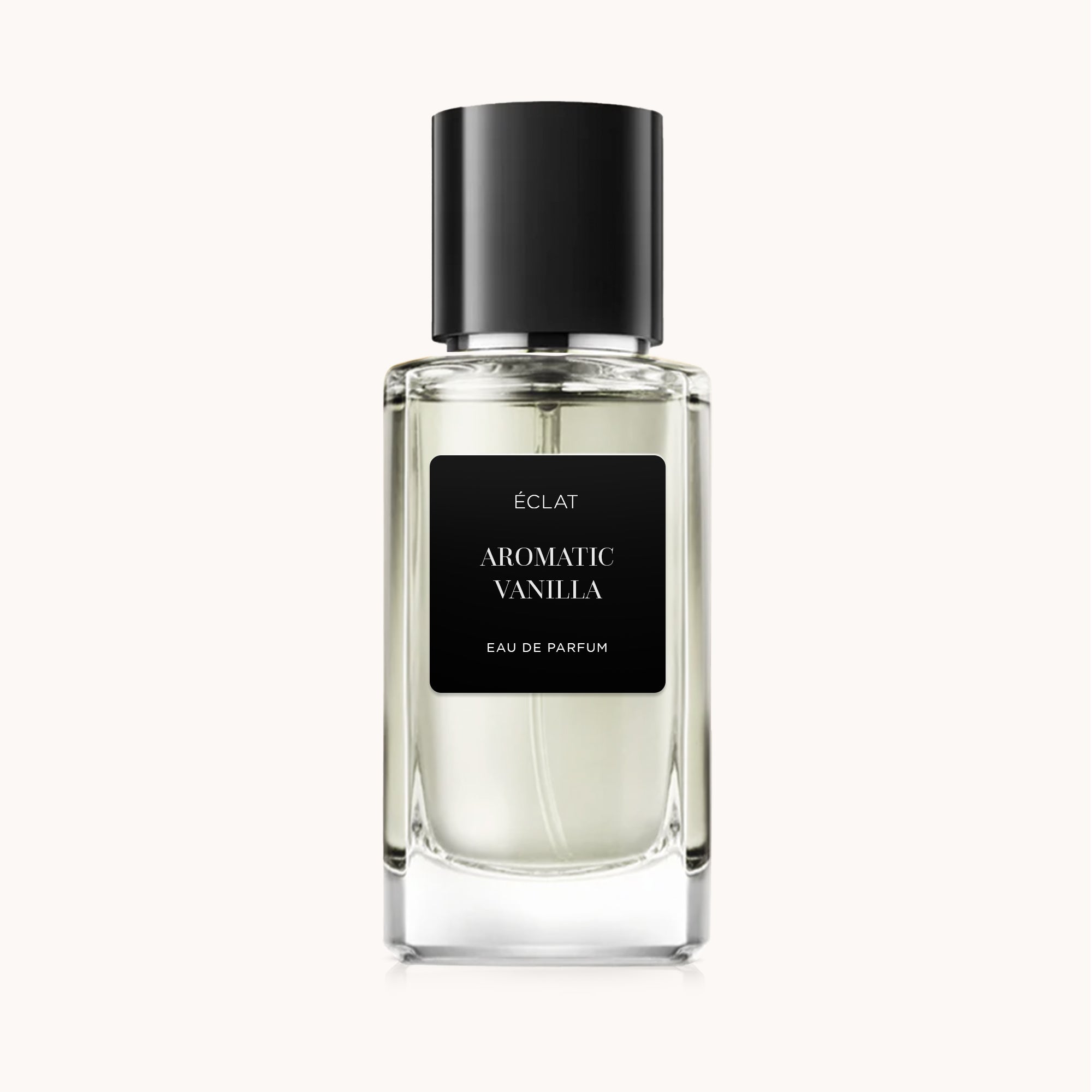 Bottiglia di vetro trasparente di ÉCLAT Aromatic Vanilla con etichetta nera e tappo abbinato.