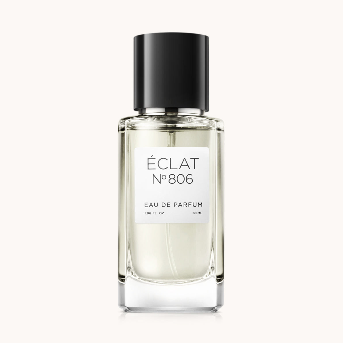 Una bottiglia di vetro trasparente ÉCLAT Citron & Ginger con tappo nero ed etichetta bianca.
