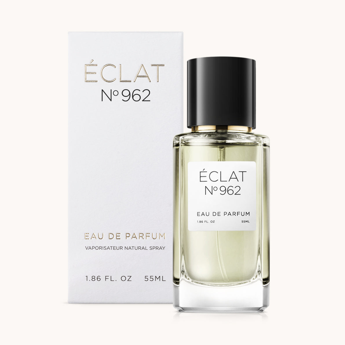 Elegante flacone di vetro con tappo nero ed etichetta bianca, posizionato accanto alla confezione bianca ÉCLAT Citrus Fig Leaf.