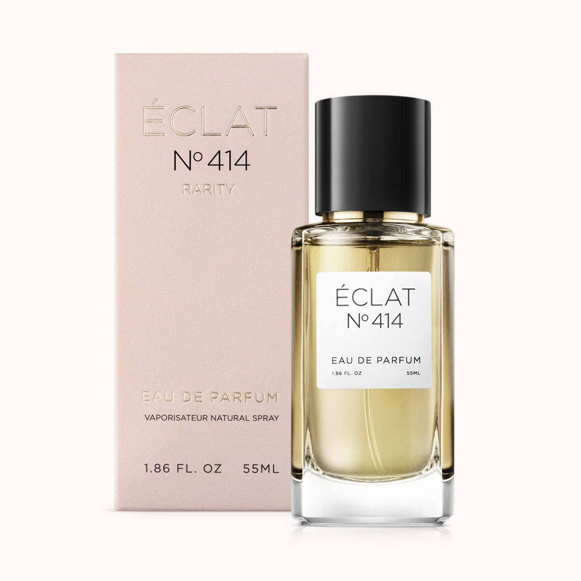 ÉCLAT Creamy Frangipani presenta un flacone in vetro sfaccettato con tappo nero, accanto a una confezione rosa.