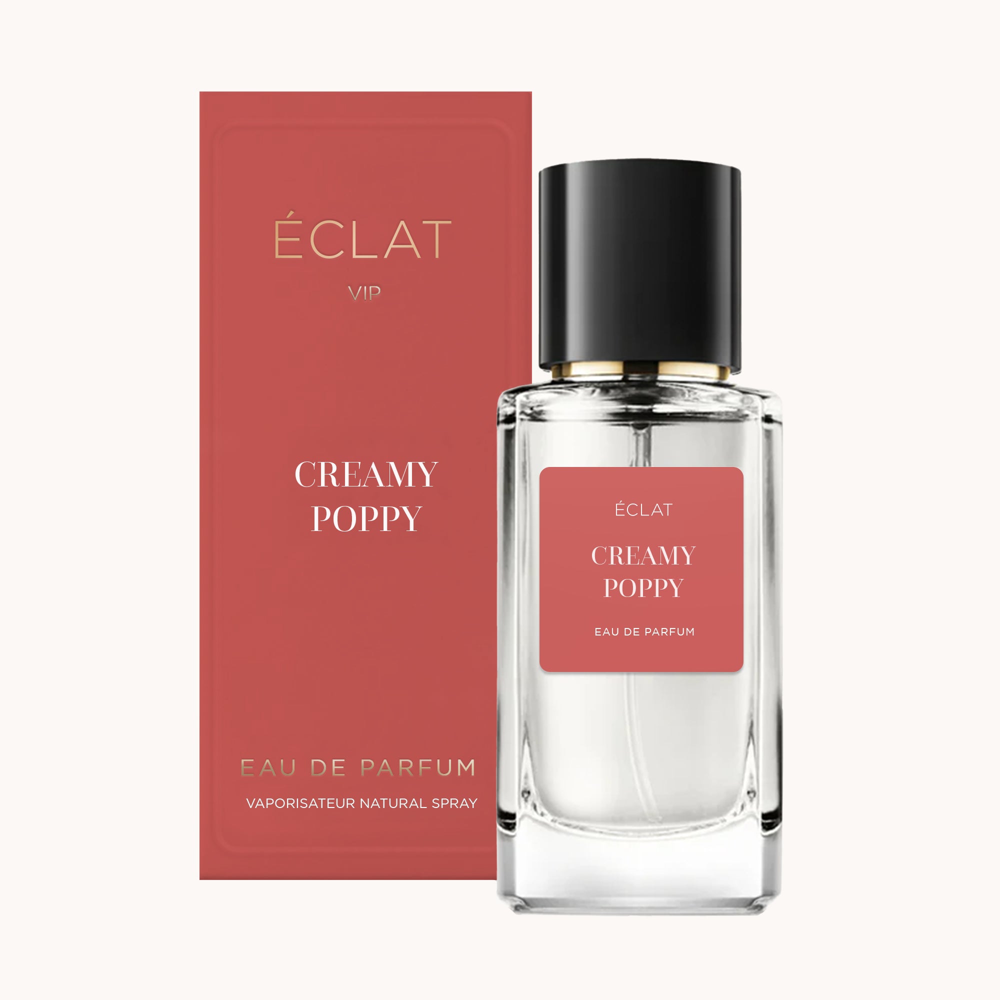 La fragranza ÉCLAT Creamy Poppy è presentata in un flacone di vetro trasparente con tappo nero, accompagnata da una scatola rossa coordinata.