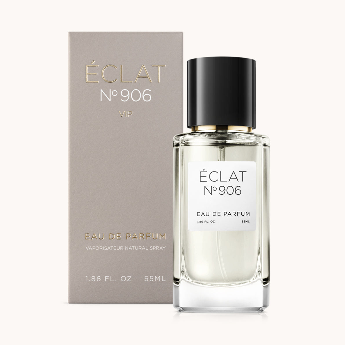 Sofisticato flacone in vetro di ÉCLAT Creamy Ylang-Ylang con tappo nero, accompagnato da un'elegante confezione grigia.