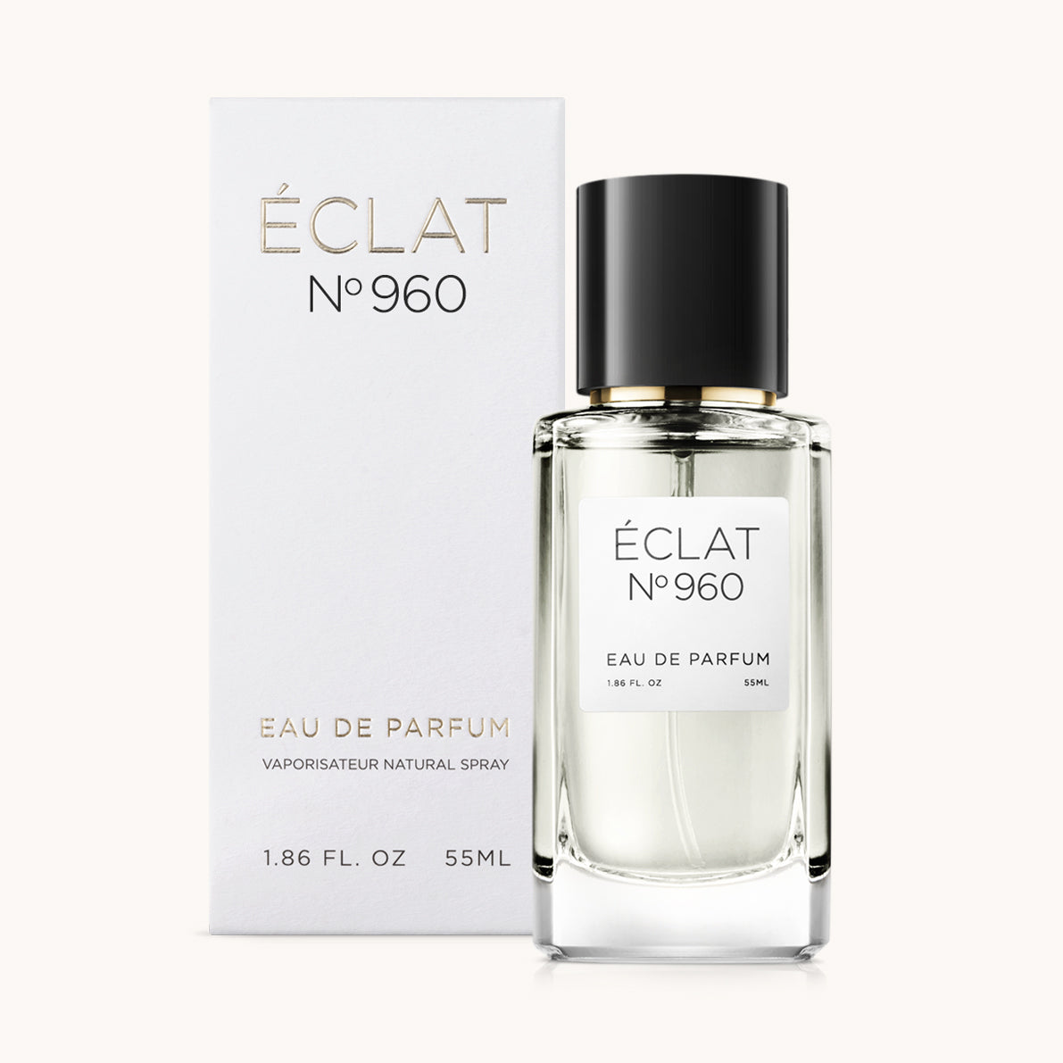 Boccetta di profumo ÉCLAT Fresh Ginger con tappo nero ed etichetta bianca, accompagnata dalla sua elegante confezione bianca.