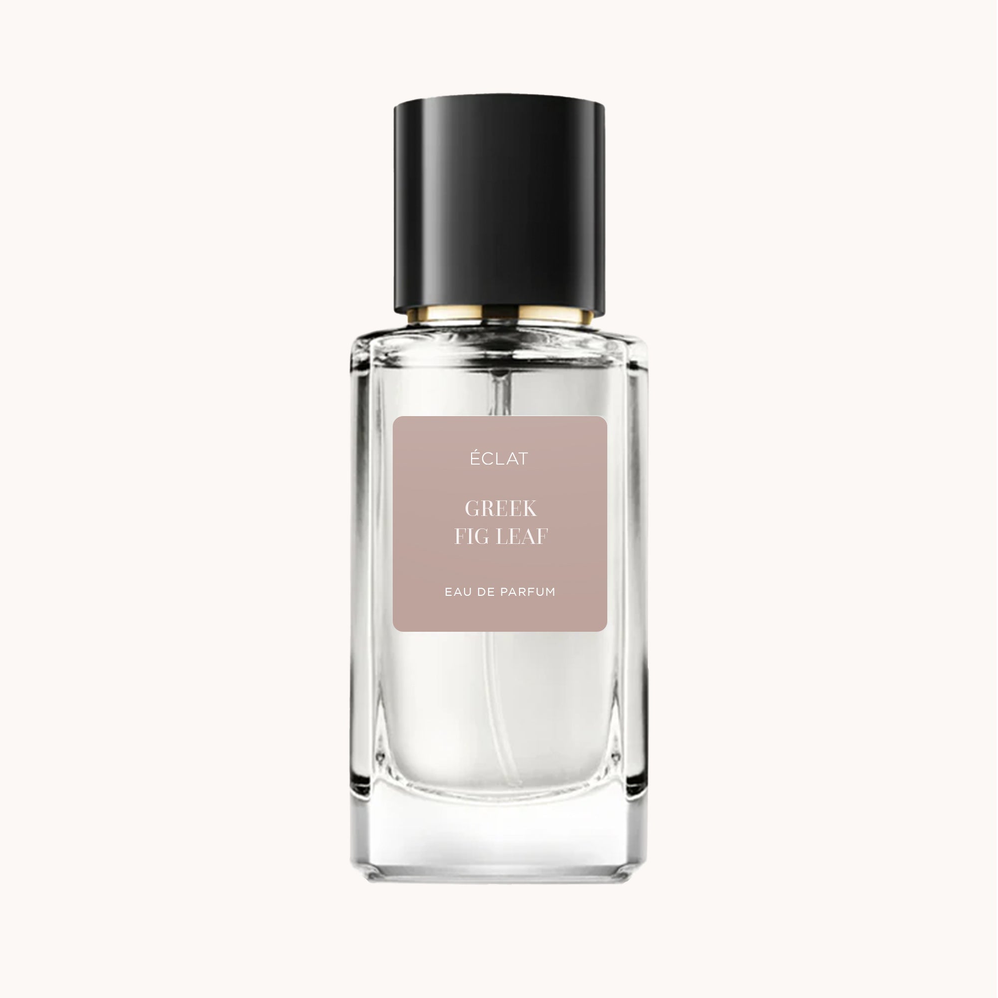 Un flacone in vetro sfaccettato di ÉCLAT Greek Fig Leaf con etichetta opaca e tappo nero elegante.