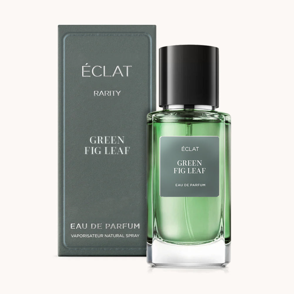 ÉCLAT Green Fig Leaf in un flacone di vetro verde traslucido con tappo nero, accanto a una scatola verde coordinata con testo argento.