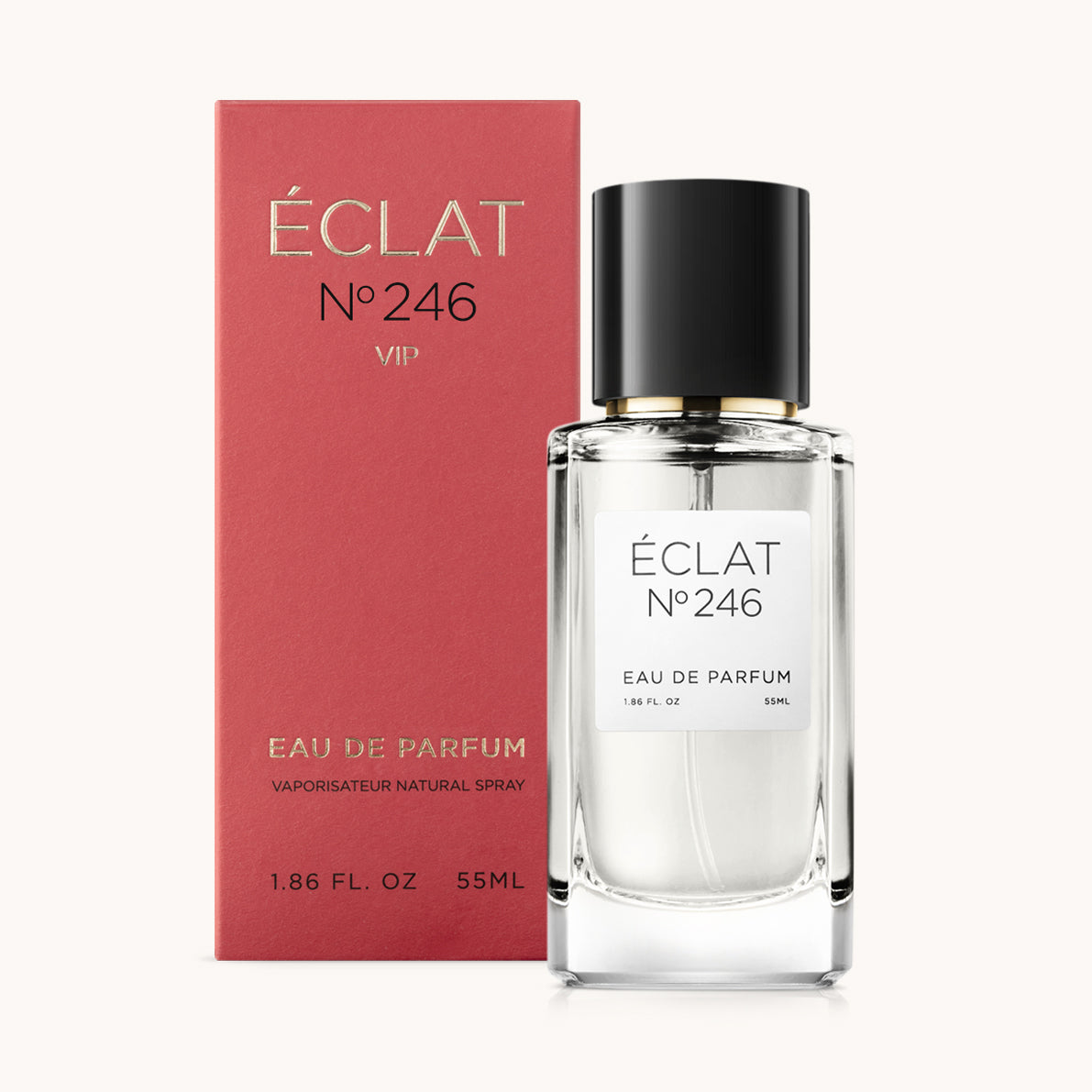 Il profumo ÉCLAT VIP Green Leafs & Freesia presenta un flacone in vetro trasparente con un elegante tappo nero, accanto a una scatola rossa.