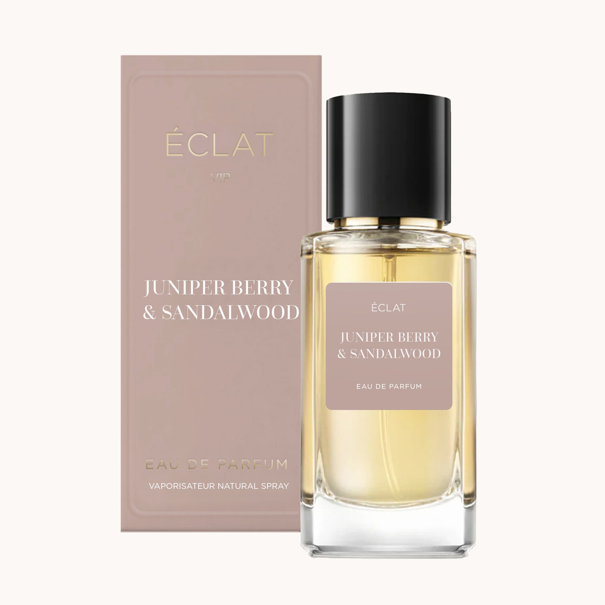 ÉCLAT Juniper Berry & Sandalwood, un raffinato flacone in vetro con tappo nero accompagnato da un'elegante scatola coordinata.