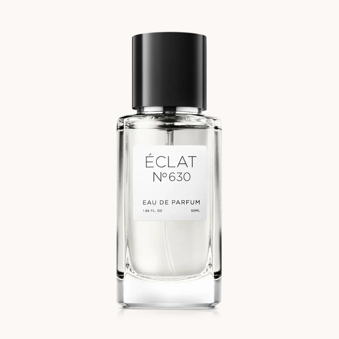 Flacone di vetro trasparente di ÉCLAT Leathery Cedar con tappo nero ed etichetta bianca minimalista.