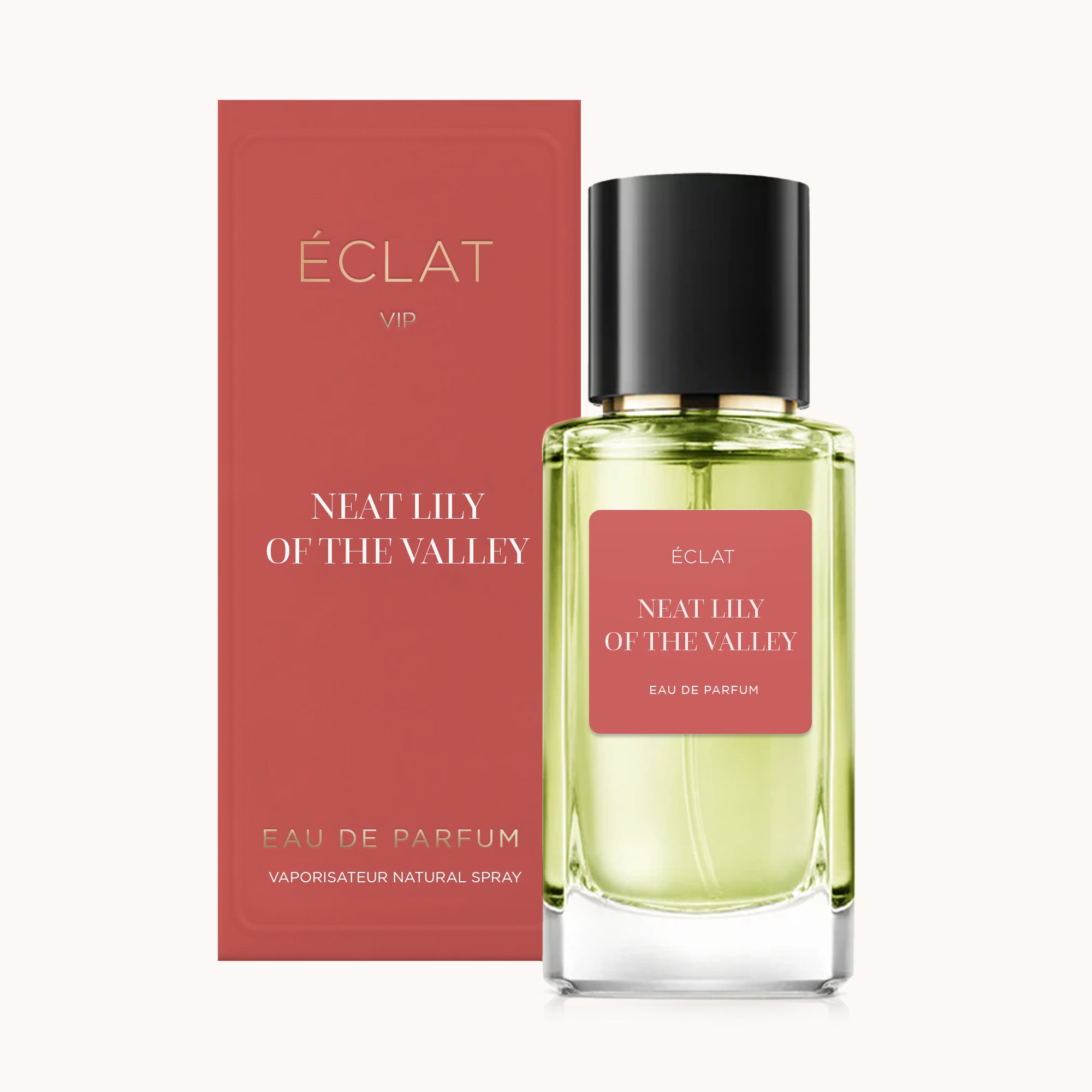 La bottiglia di profumo ÉCLAT Neat Lily of the Valley VIP con flacone in vetro trasparente e tappo nero è esposta accanto alla sua elegante confezione rossa.