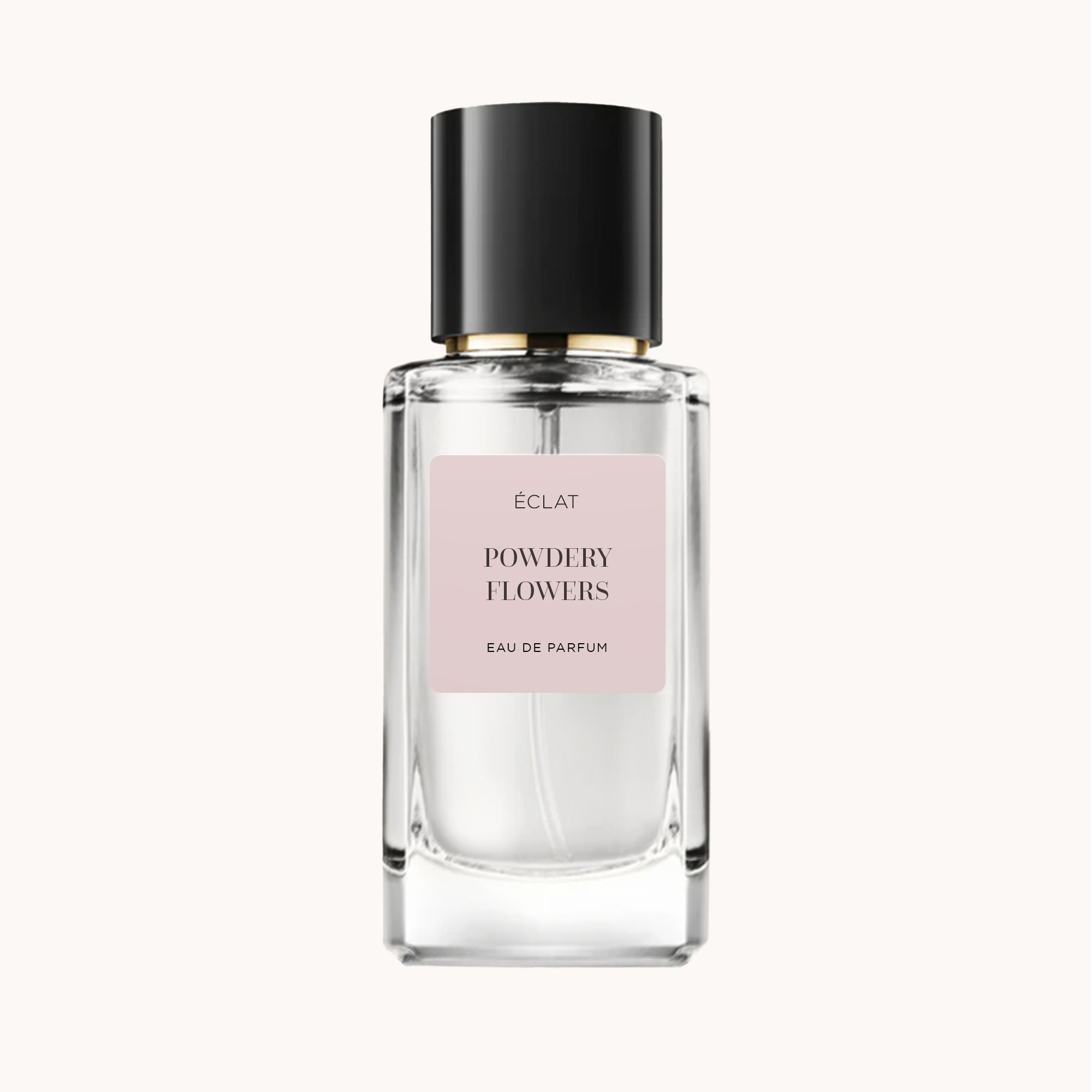 ÉCLAT Powdery Flowers in un flacone di vetro trasparente con tappo nero ed etichetta rosa.