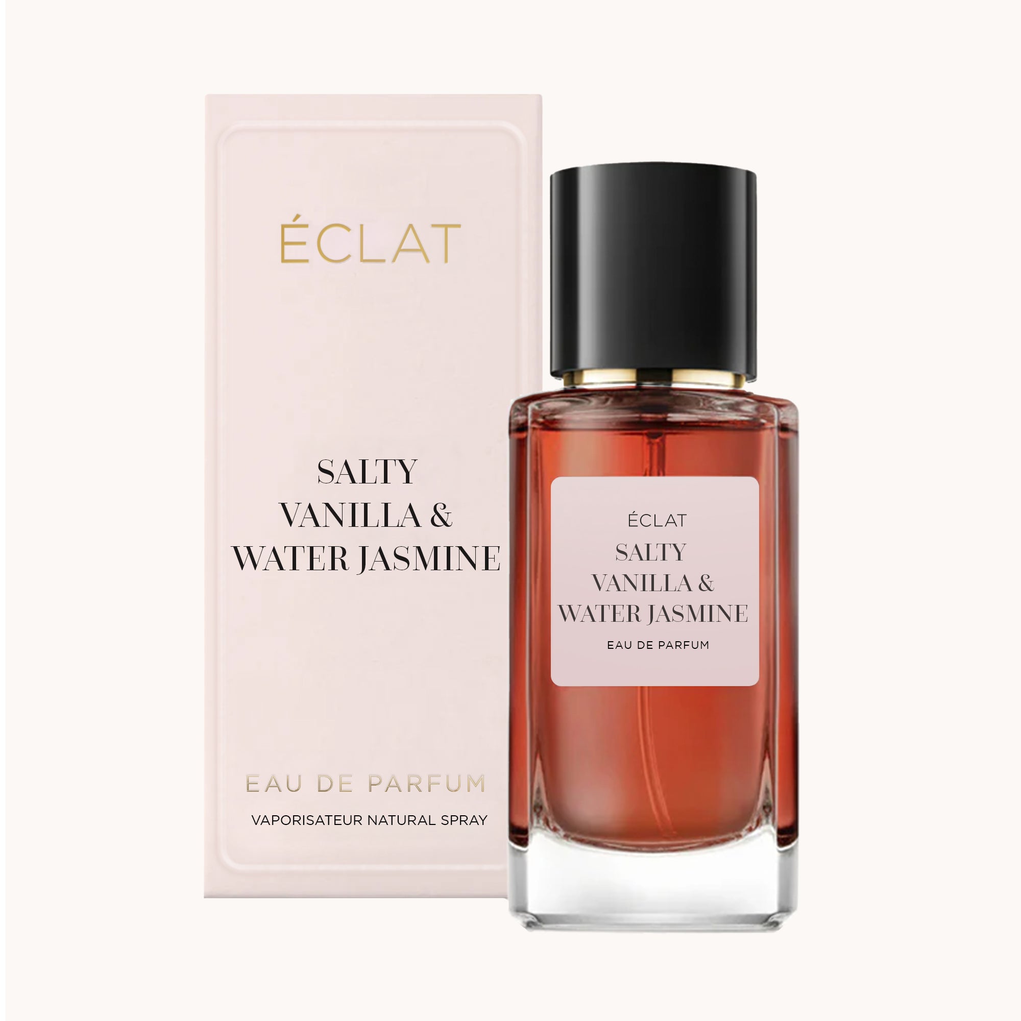 Profumo ÉCLAT Salty Vanilla & Water Jasmine con flacone in vetro color ambra e tappo nero, accompagnato da una scatola chiara.