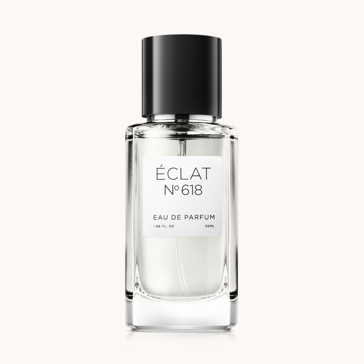 Profumo ÉCLAT Sweet Spicy Tagetes in un flacone di vetro trasparente con tappo nero ed etichetta bianca.