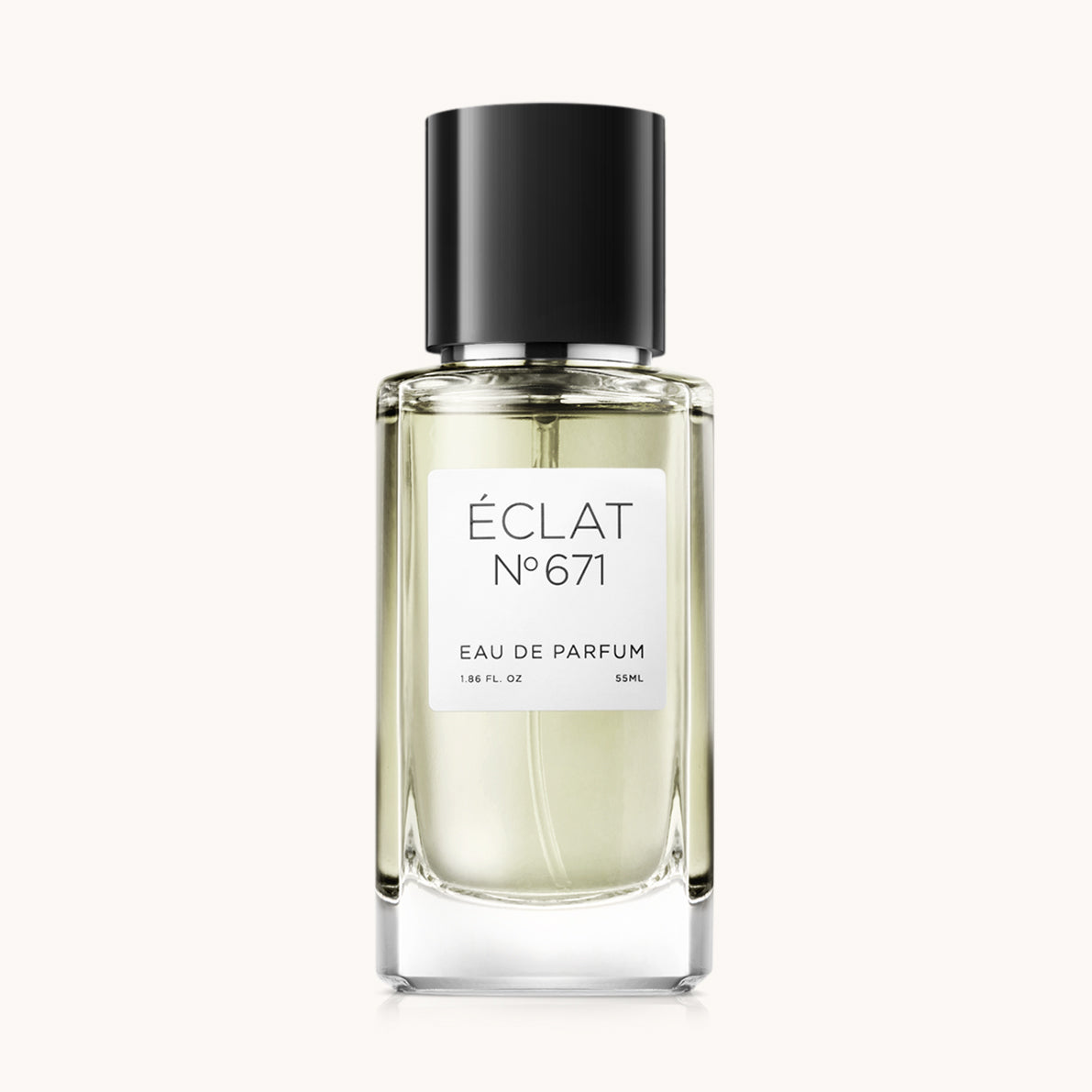 ÉCLAT Synthetic Tangerine in un flacone di vetro trasparente con tappo nero ed etichetta bianca.