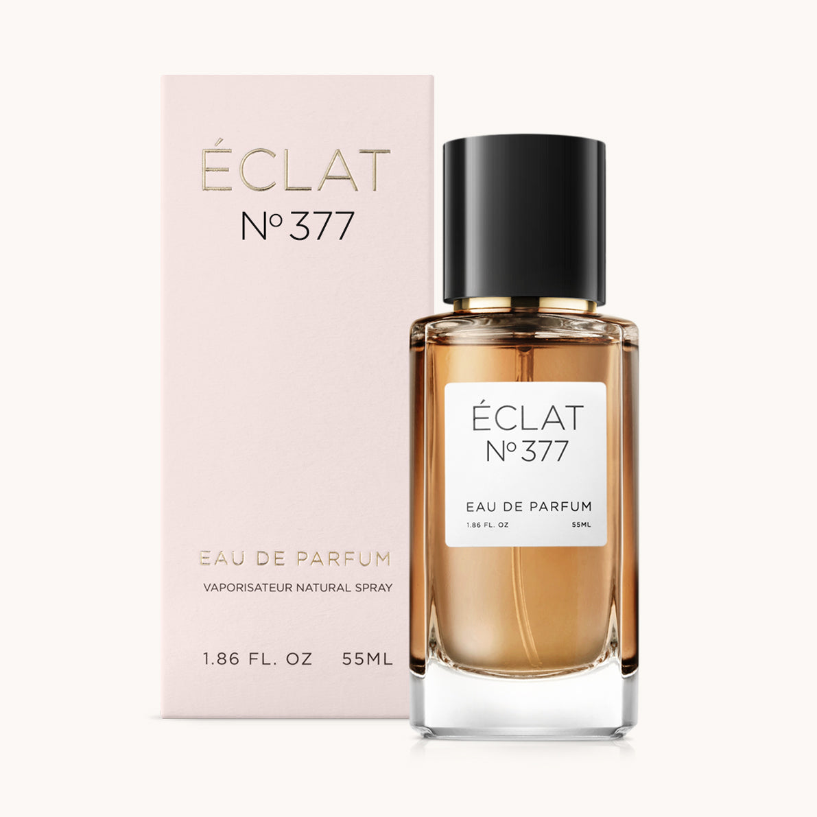 ÉCLAT Vanilla & Popcorn in un flacone di vetro sfaccettato con tappo nero, posizionato davanti a una scatola rosa tenue.