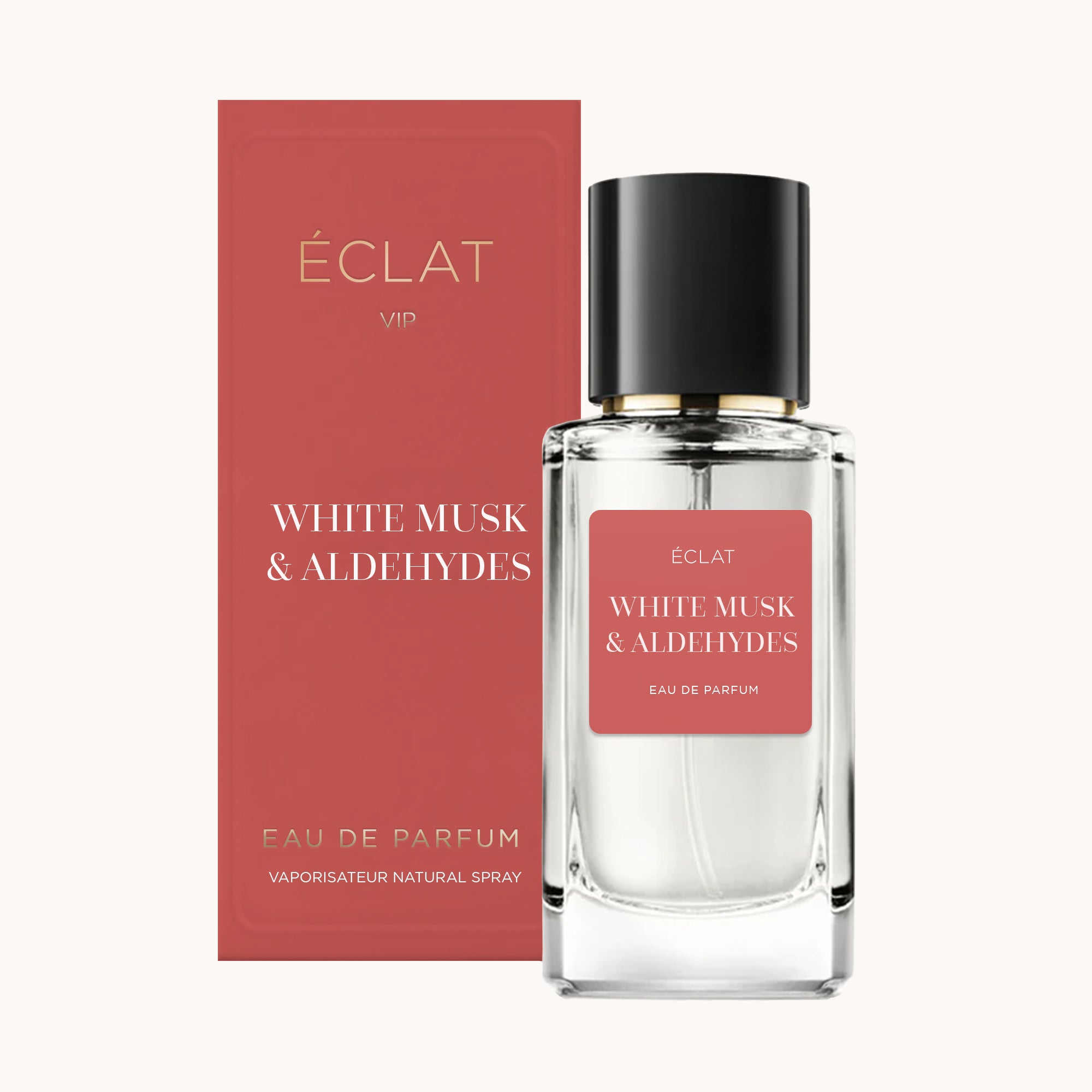 Elegante flacone di vetro di ÉCLAT White Musk & Aldehydes con tappo nero, accanto a una scatola rossa con accenti dorati.