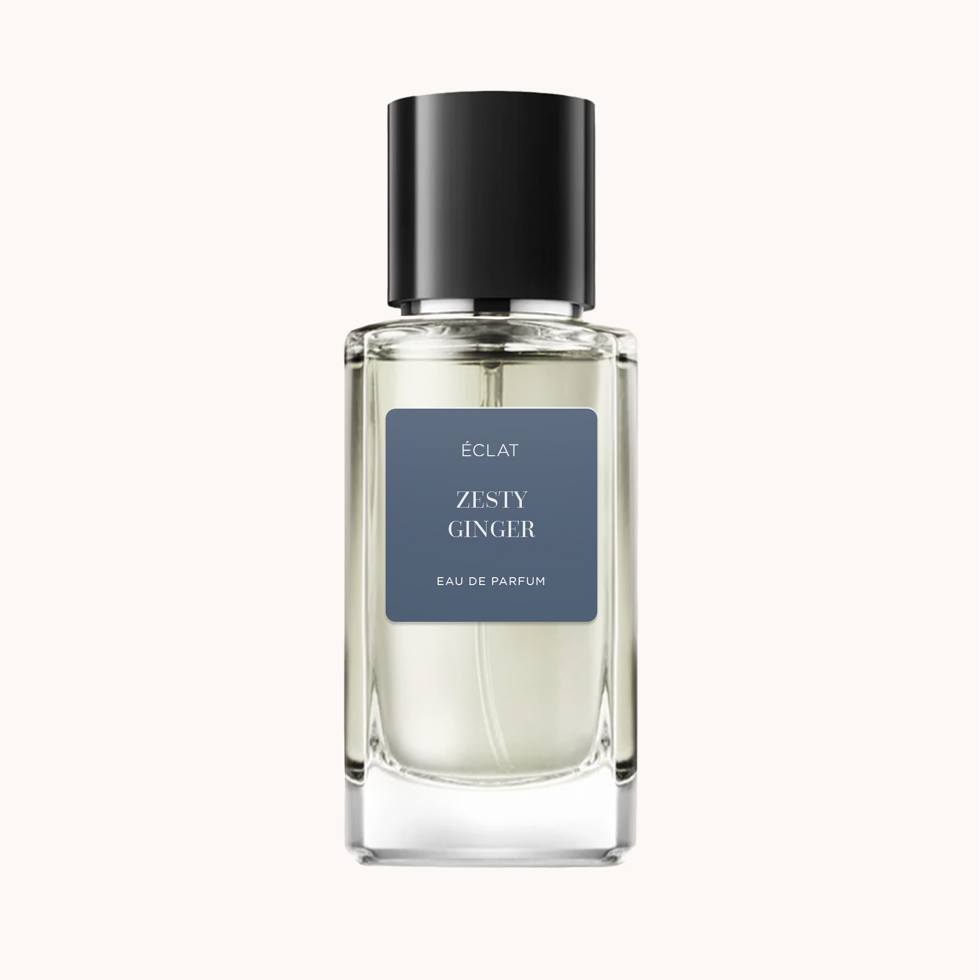 Flacone in vetro sfaccettato di ÉCLAT Zesty Ginger con tappo nero elegante e etichetta opaca.